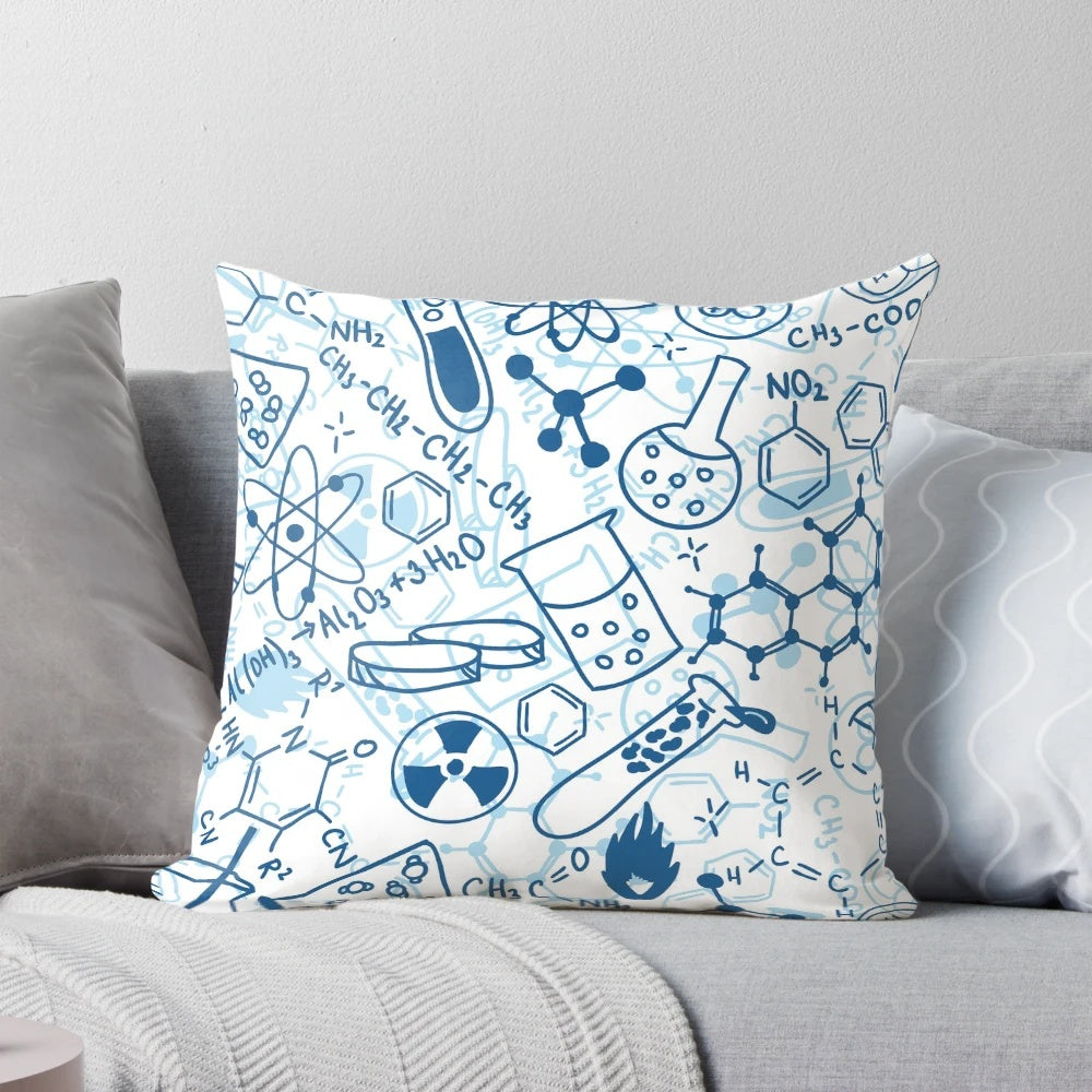 Colorful chemistry-themed pillow with scientific elements like beakers, test tubes, and atoms