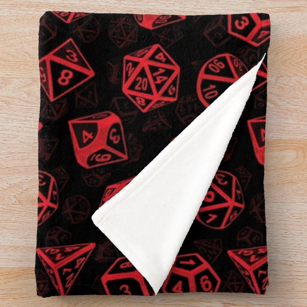 Soft, cozy plush blanket featuring a repeating pattern of d20 dice, perfect for Dungeons and Dragons and other tabletop role-playing game enthusiasts.