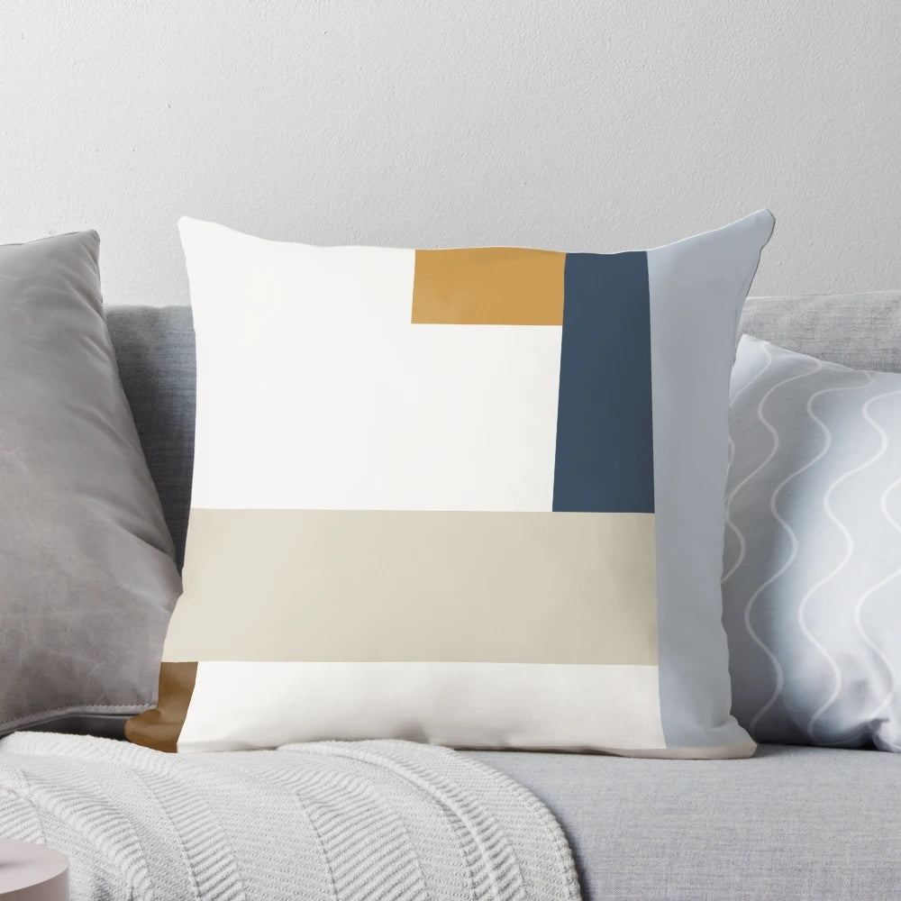 Colorful geometric abstract art print on a modern throw pillow, featuring a mid-century modern inspired design.