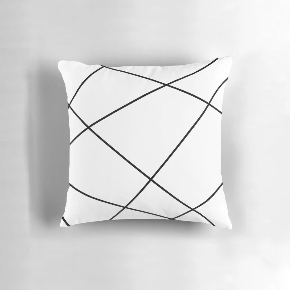 Geometric abstract black and white pattern pillow, ideal for modern home decor