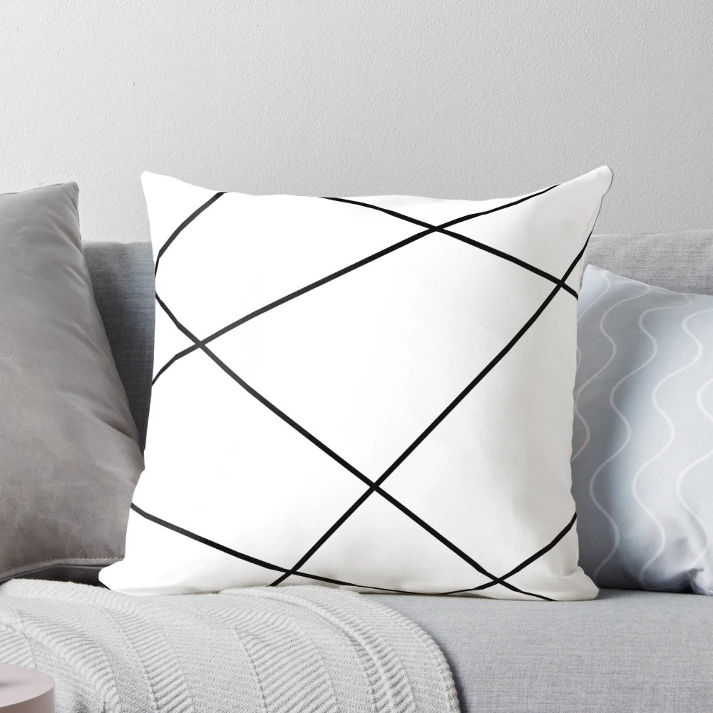 Geometric abstract black and white pattern pillow, ideal for modern home decor