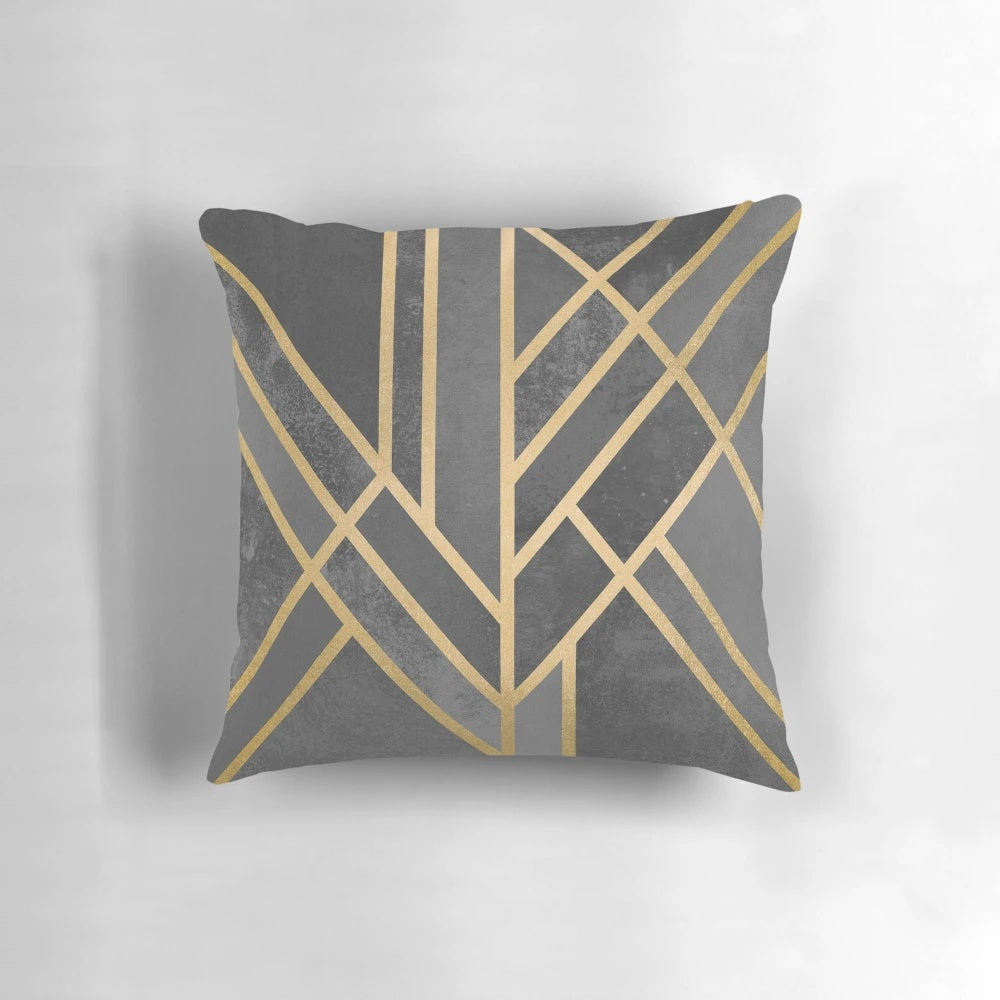 Geometric abstract design throw pillow with grey, gold, and concrete elements