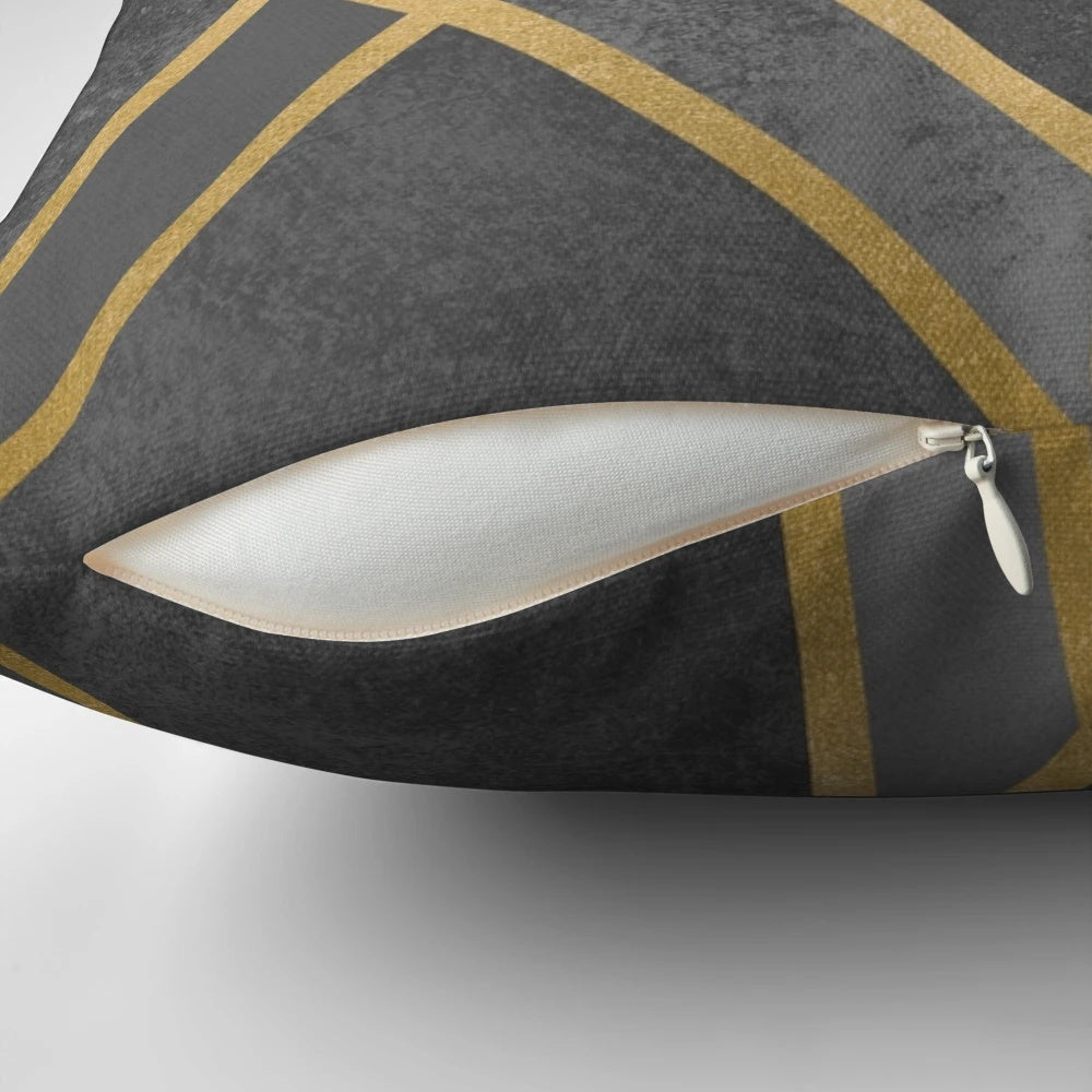 Geometric abstract design throw pillow with grey, gold, and concrete elements