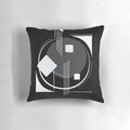 Geometric abstract black and white pillow with a modern Scandinavian design featuring hexagons, triangles, and lineart.