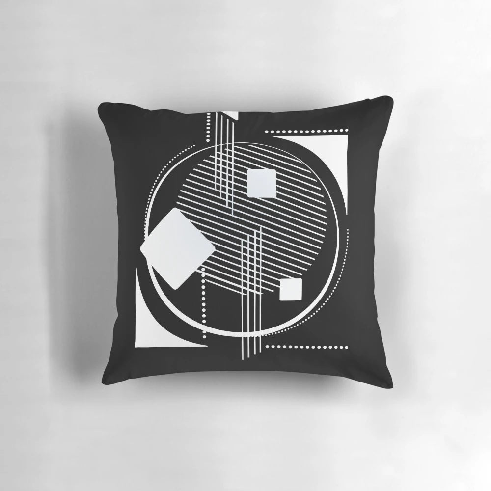 Geometric abstract black and white pillow with a modern Scandinavian design featuring hexagons, triangles, and lineart.