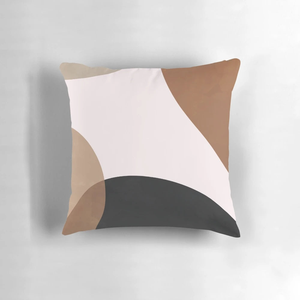 Abstract geometric shapes in neutral earth tones on a modern Scandinavian-style throw pillow