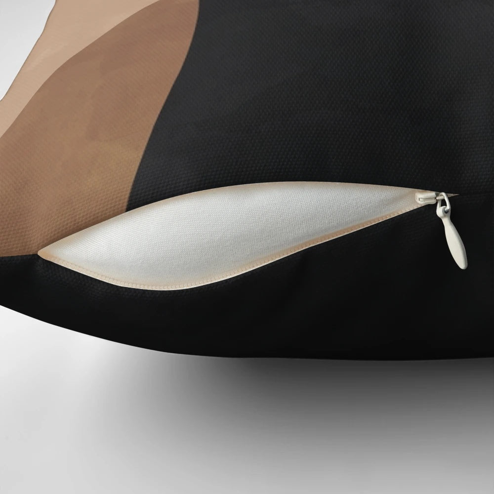 Abstract geometric shapes in neutral earth tones on a modern Scandinavian-style throw pillow