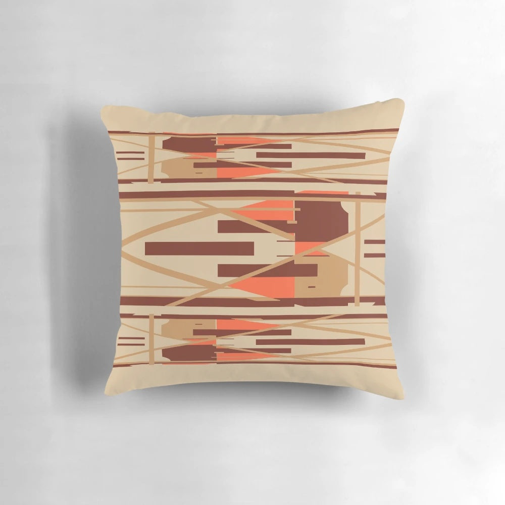 Geometric abstract design pillow in shades of tan, orange, and brown.