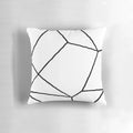 Geometric black and white throw pillow with a modern, minimalist design featuring mosaic lines and a square shape.
