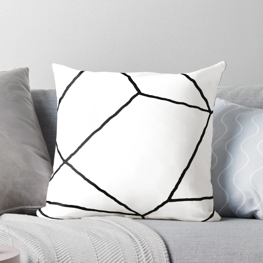 Geometric black and white throw pillow with a modern, minimalist design featuring mosaic lines and a square shape.