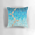 Decorative pillow featuring a modern geometric cubist design in shades of blue and gold