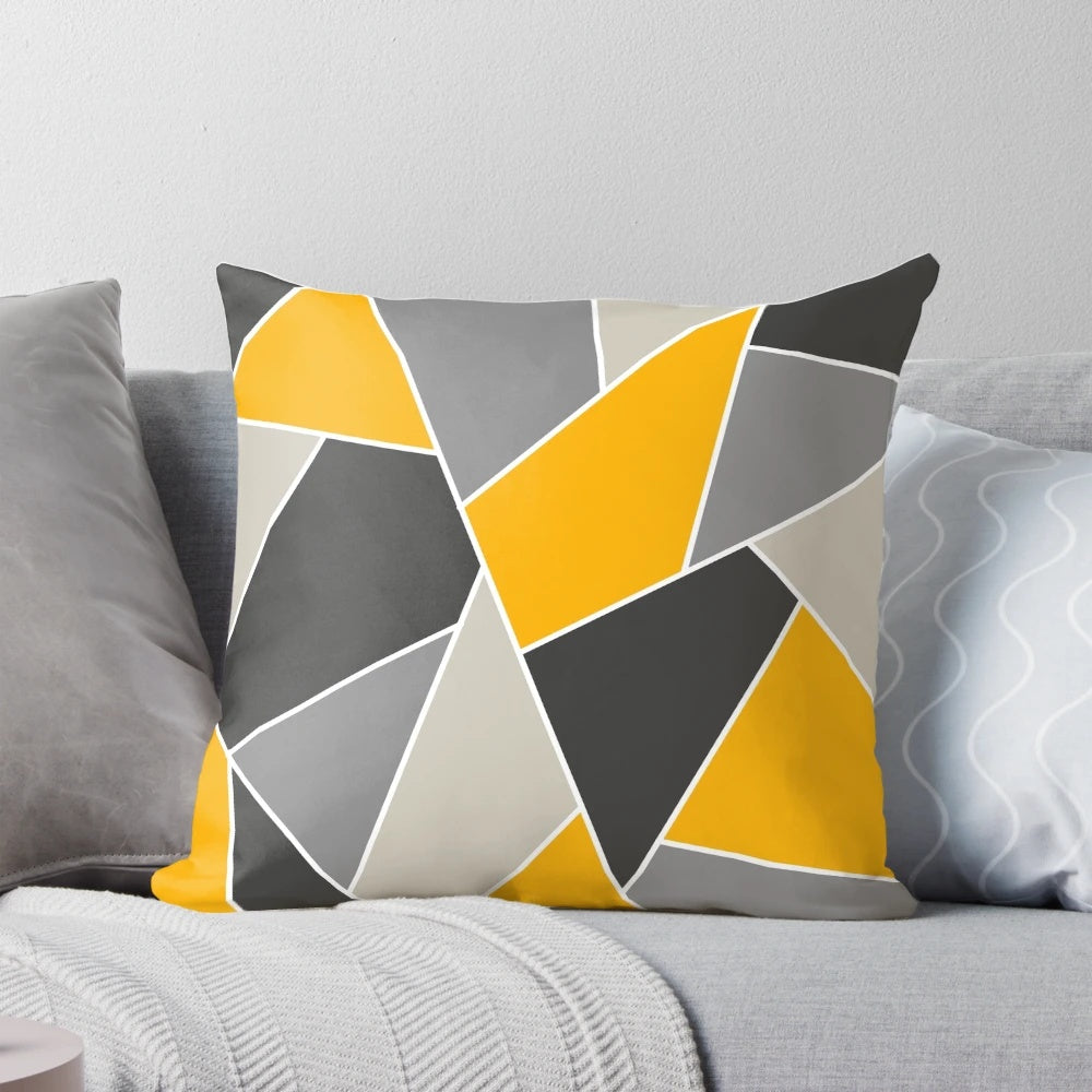 Geometric line mustard grey design pillow with a modern mosaic pattern.