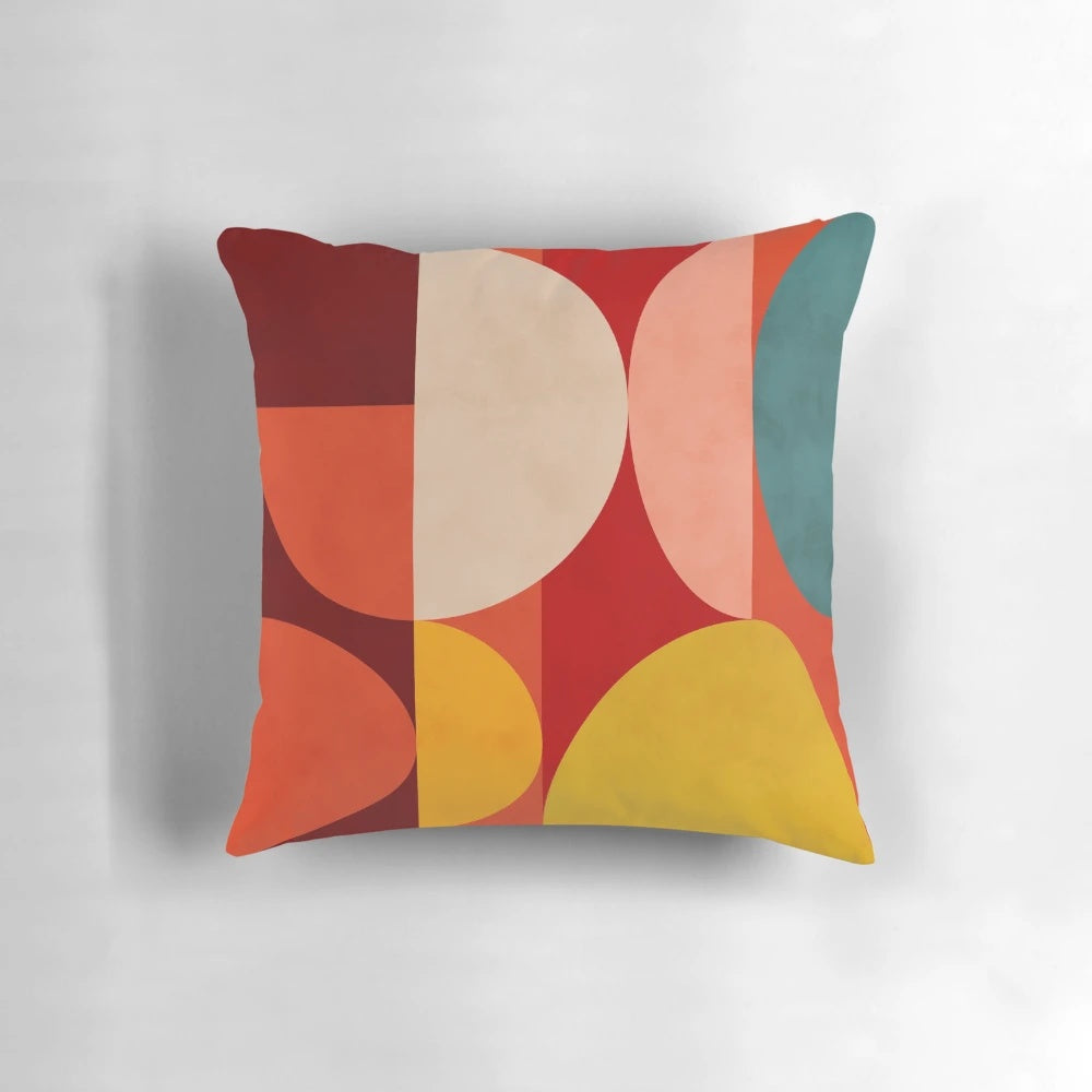 Geometric mid-century inspired wall art pillow with circular and semicircular shapes