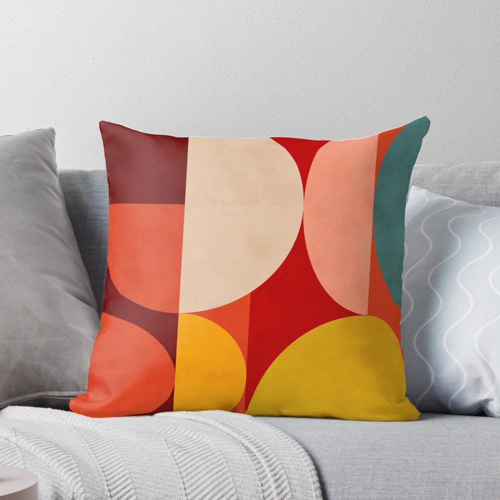 Geometric mid-century inspired wall art pillow with circular and semicircular shapes