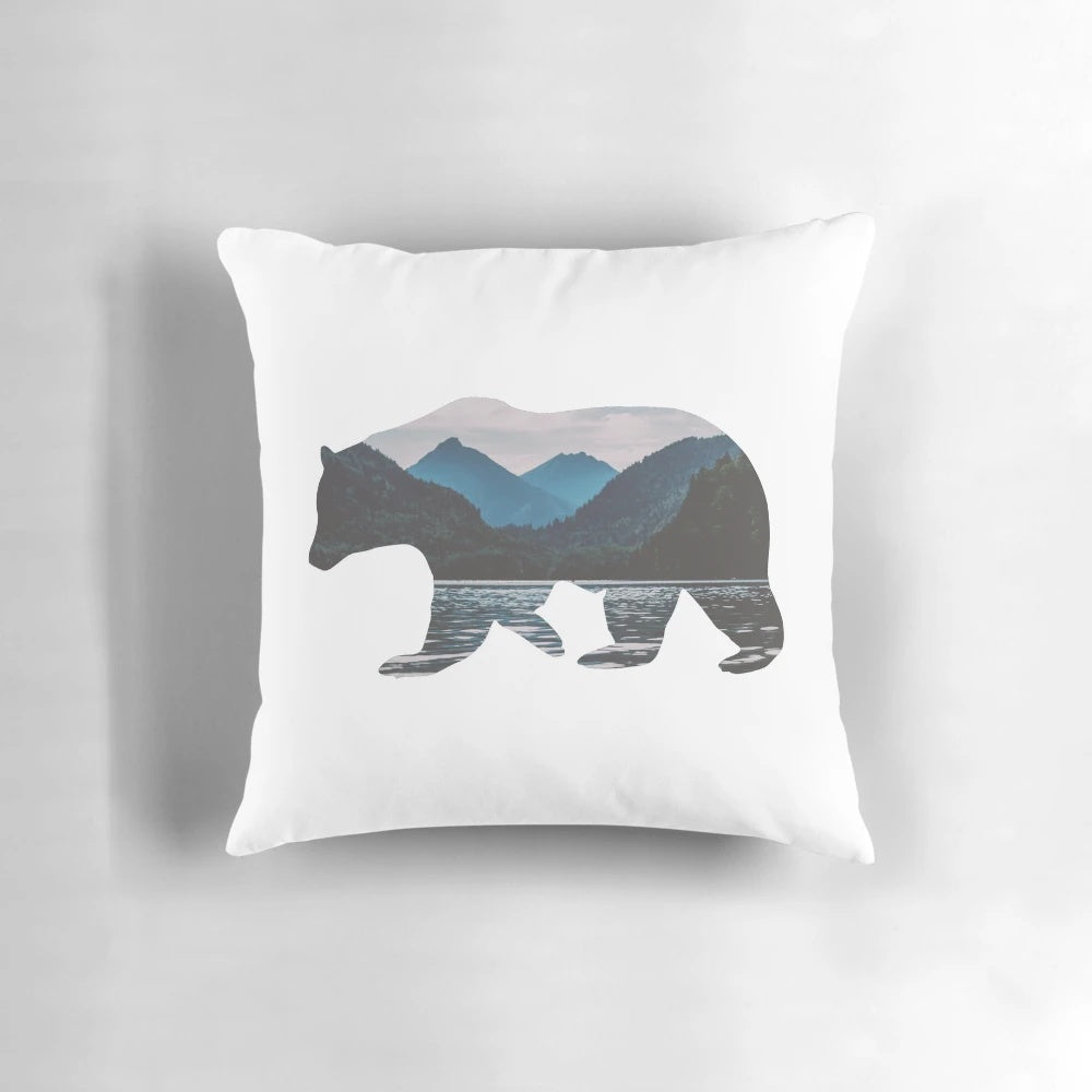 Geometric mountain bear pillow design featuring a bear illustration in the Canadian Rockies landscape.