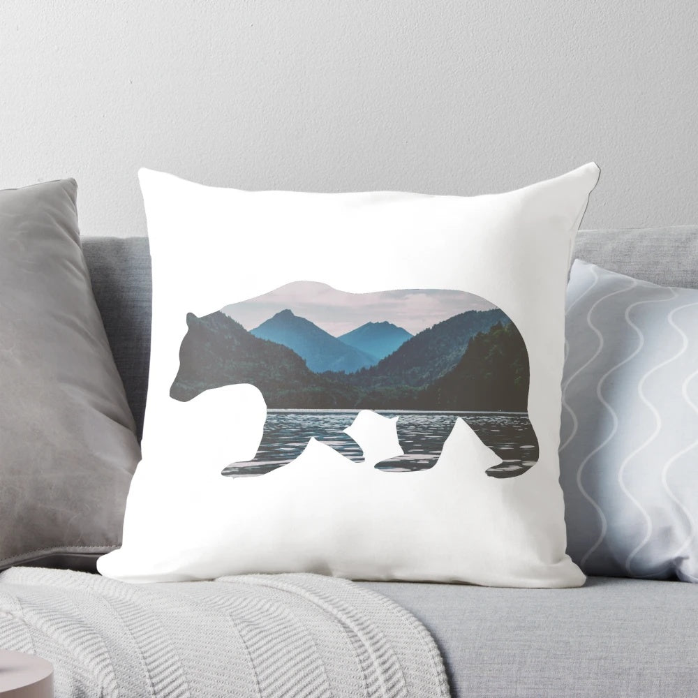 Geometric mountain bear pillow design featuring a bear illustration in the Canadian Rockies landscape.