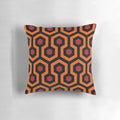 Decorative pillow with abstract geometric hexagon carpet pattern design inspired by the Overlook Hotel from Stephen King's The Shining
