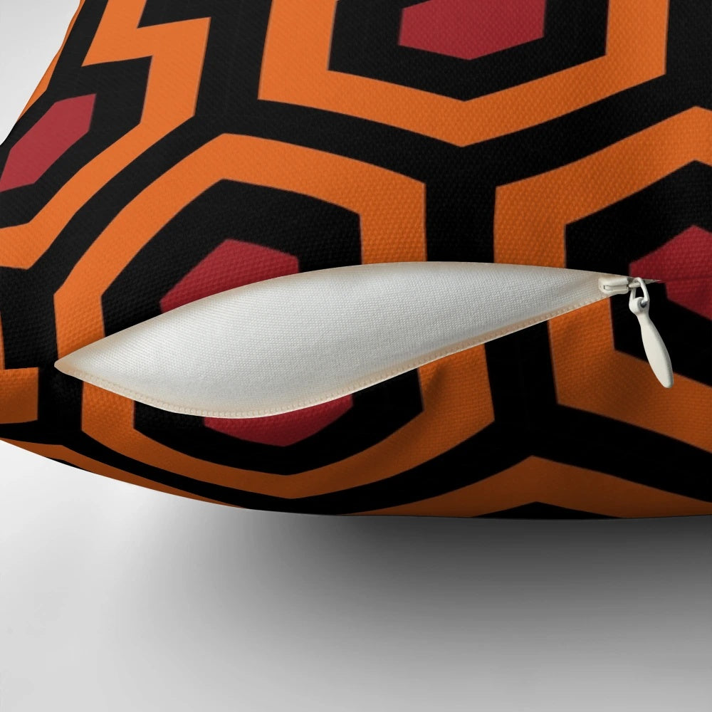 Decorative pillow with abstract geometric hexagon carpet pattern design inspired by the Overlook Hotel from Stephen King's The Shining