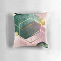 Geometric pink and emerald green throw pillow with hexagon pattern