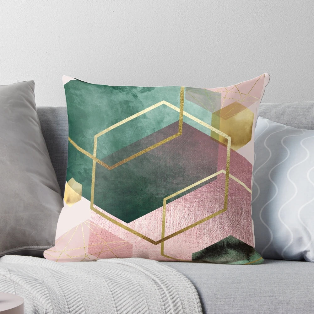 Geometric pink and emerald green throw pillow with hexagon pattern