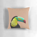 Decorative throw pillow featuring a geometric toucan design in shades of blue, yellow, and black.