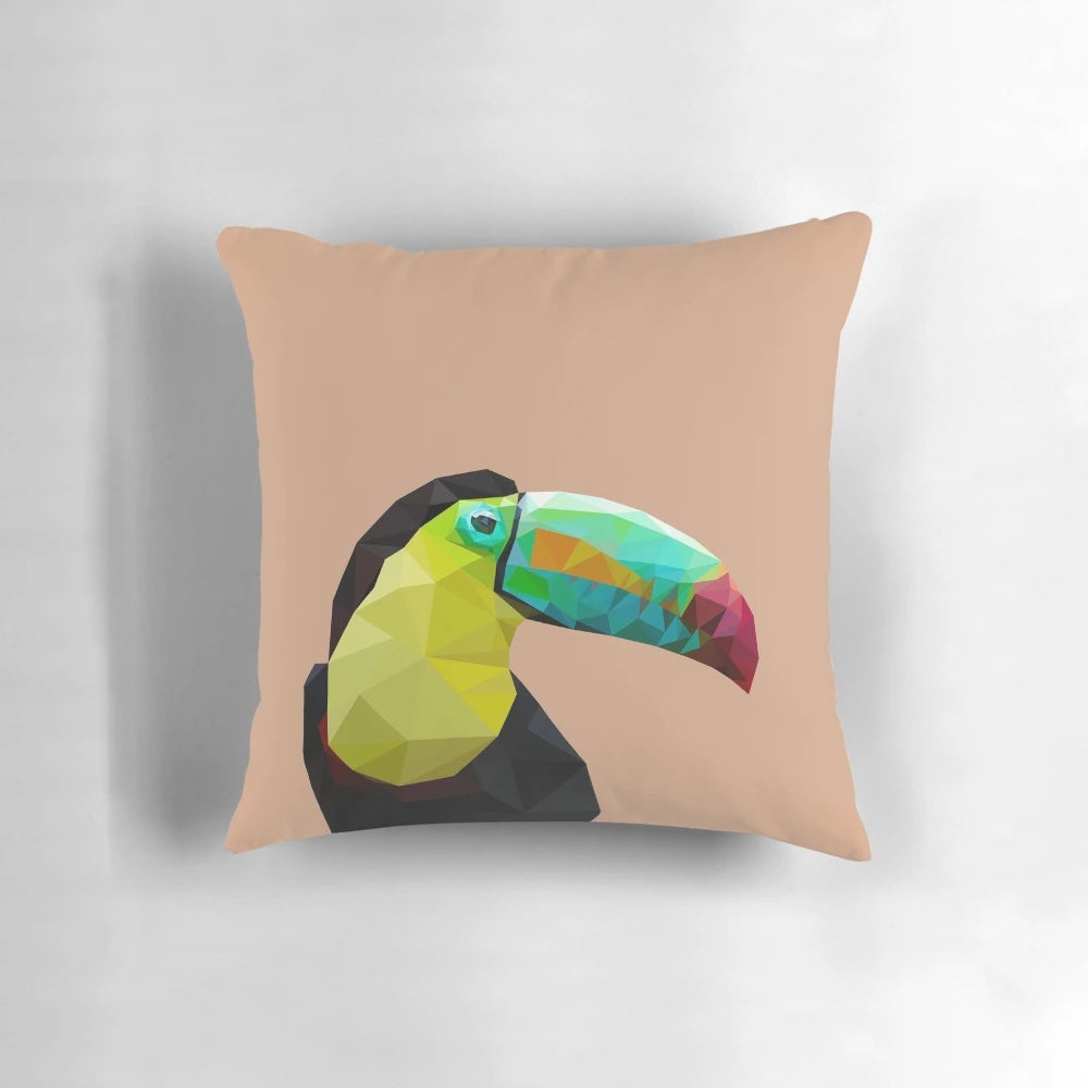 Decorative throw pillow featuring a geometric toucan design in shades of blue, yellow, and black.