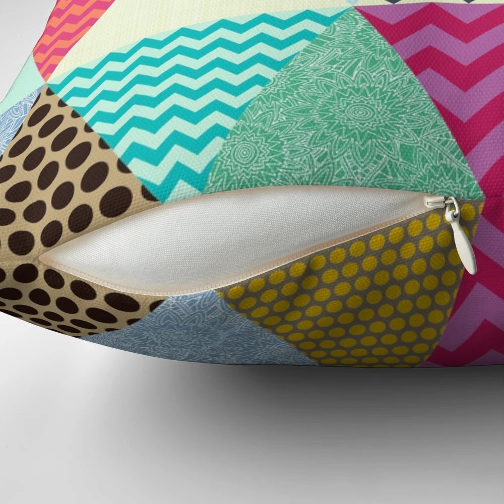 Vibrant geometric triangle patterned pillow with a modern floral design