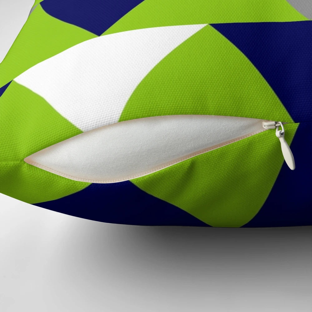 Geometric triangles patterned pillow in navy blue, lime green, and grey colors