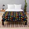 Geometry Dash themed plush blanket with geometric design