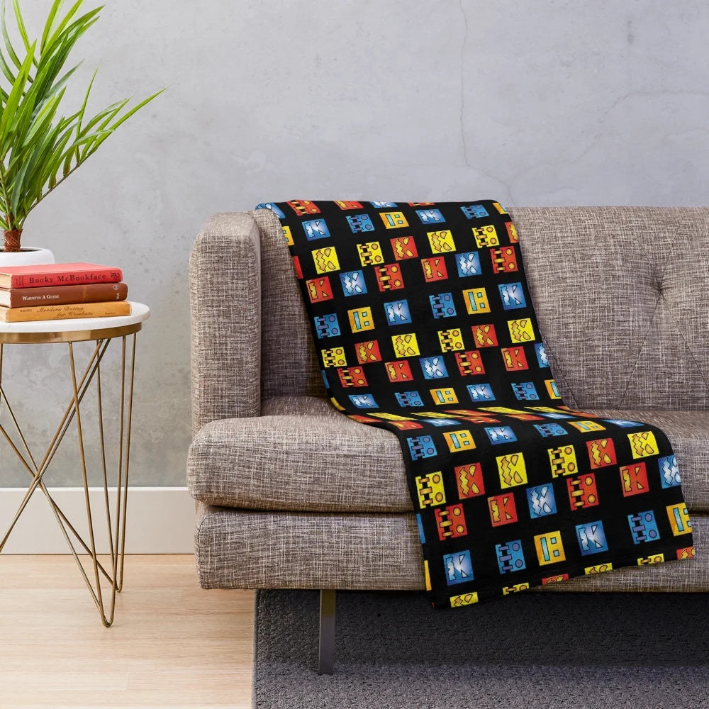 Geometry Dash themed plush blanket with geometric design