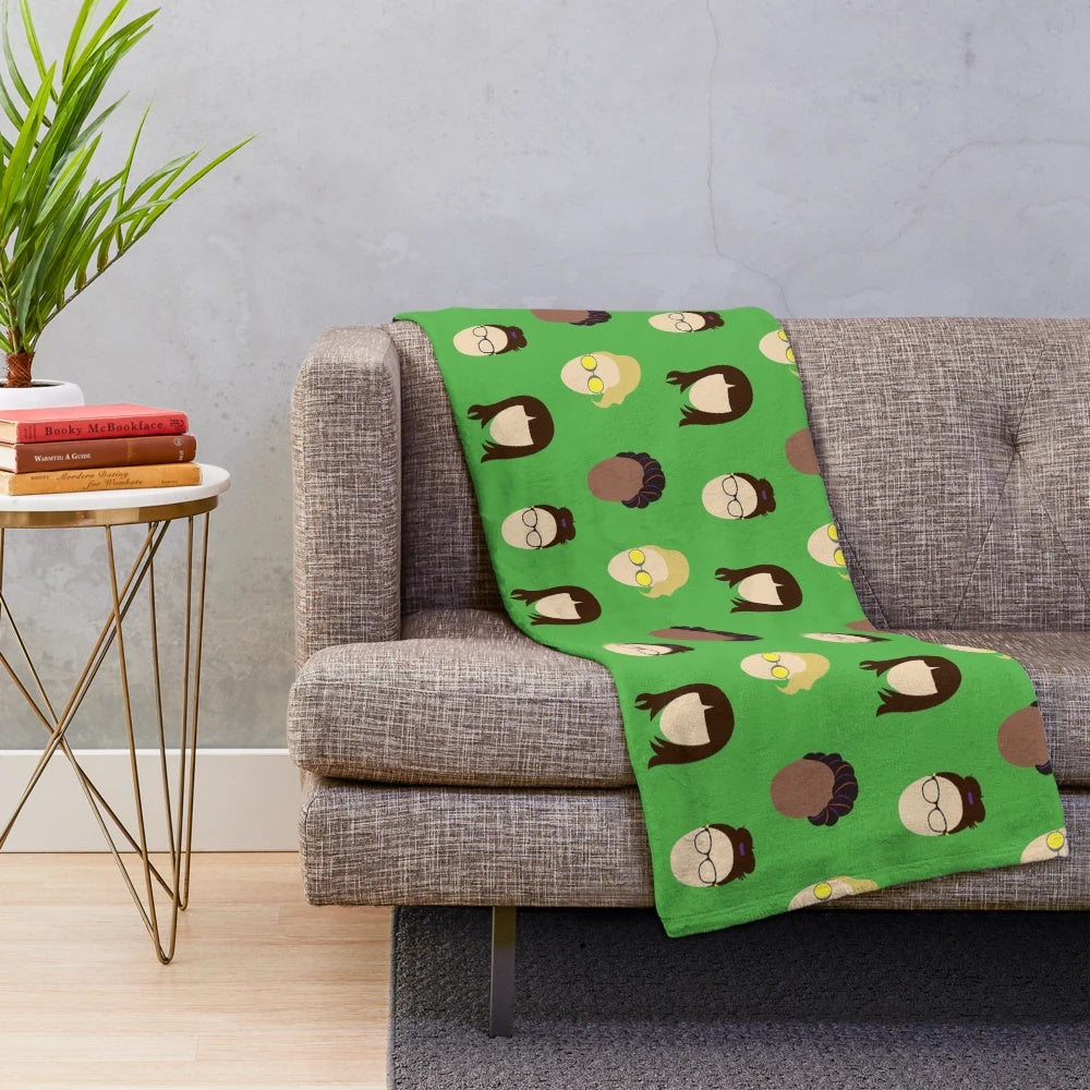 Ghostbusters inspired plush blanket with characters and ghostly elements