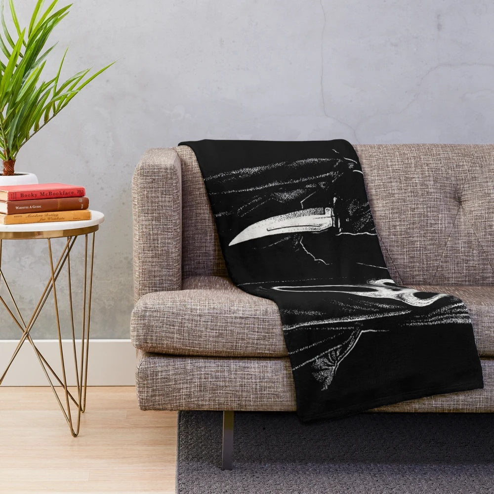 Ghostface inspired plush blanket featuring the iconic horror villain