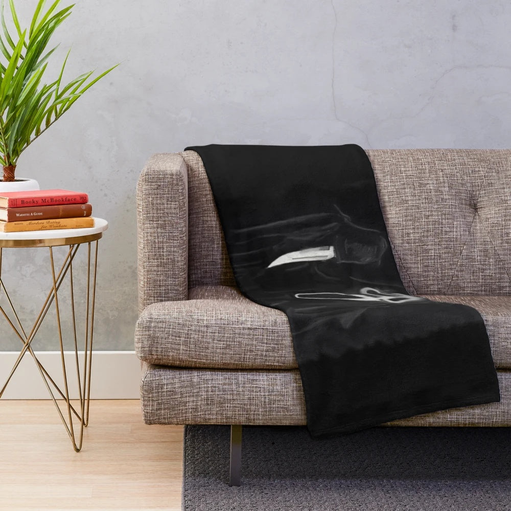 Ghostface themed plush blanket with spooky movie character design