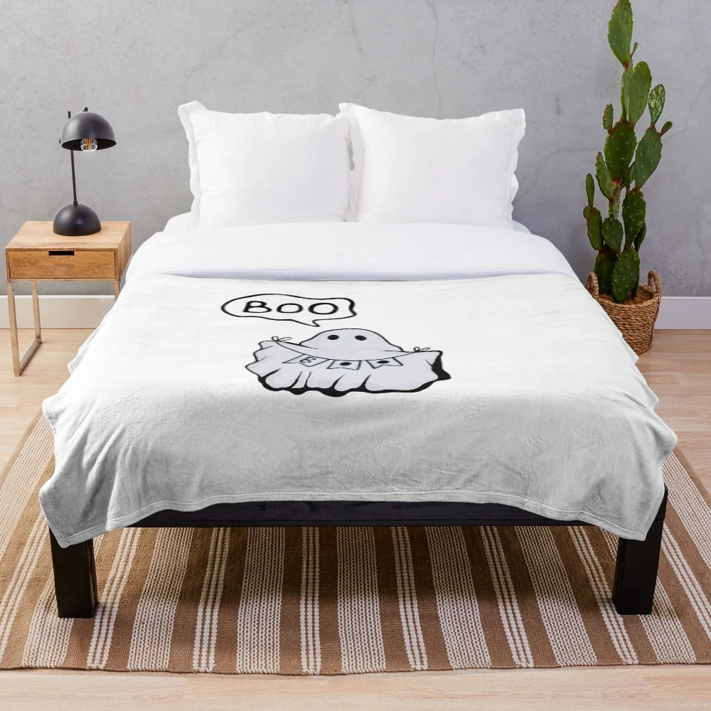 Ghostly plush blanket with a cute ghost design