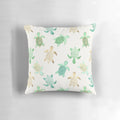 Decorative throw pillow featuring gilded jade and mint turtles, perfect for coastal home decor
