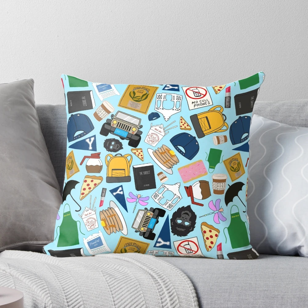 Blue pillow with all-over Gilmore pattern icons, perfect for fans
