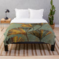 Ginkgo floral pattern on a soft, plush blanket