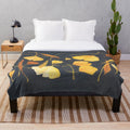 Ginkgo leaves inspired plush blanket with warm autumn colors