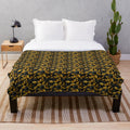 Ginkgo leaves pattern plush blanket in golden, fall-inspired colors