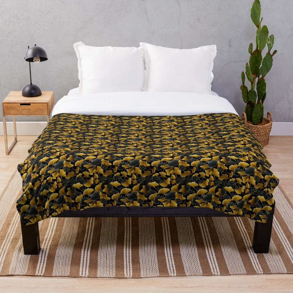 Ginkgo leaves pattern plush blanket in golden, fall-inspired colors