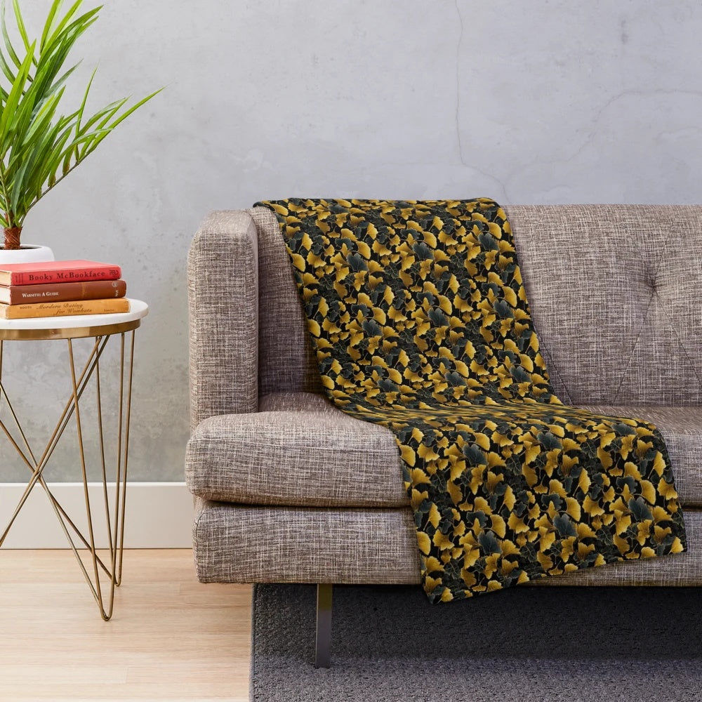 Ginkgo leaves pattern plush blanket in golden, fall-inspired colors