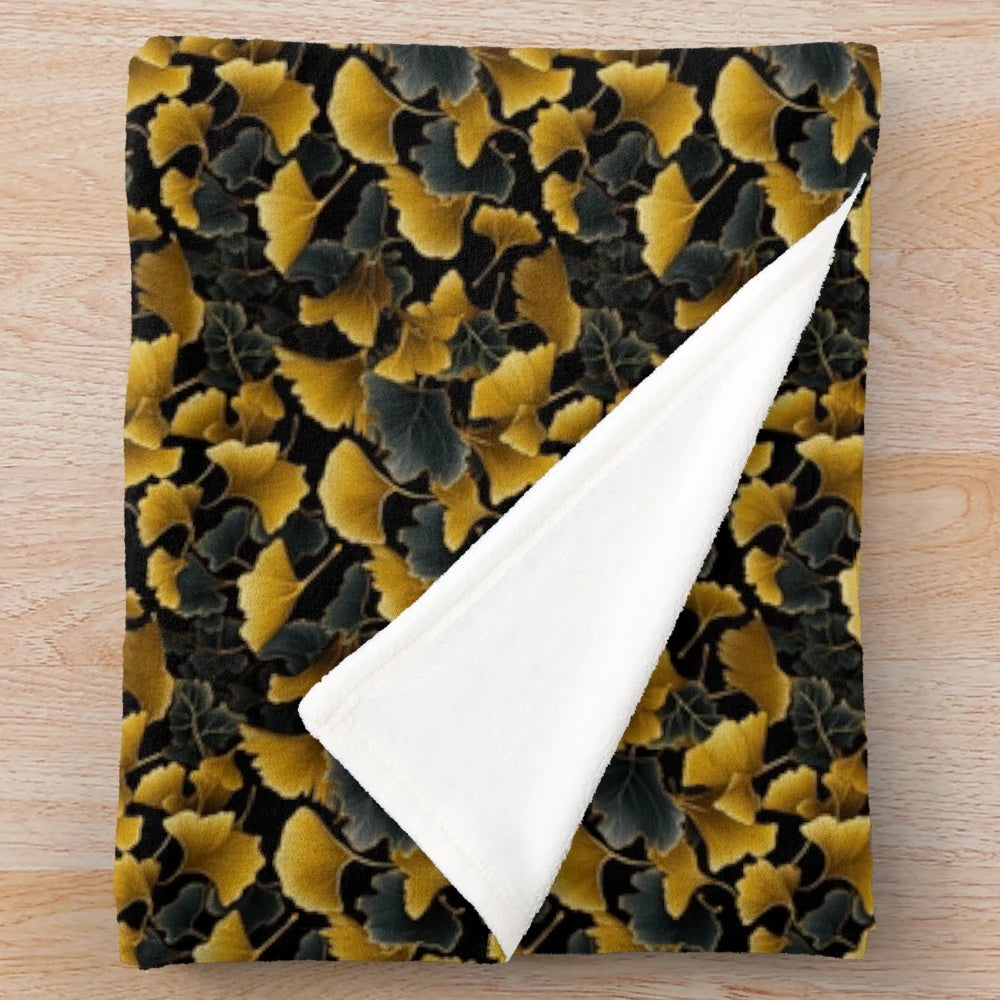 Ginkgo leaves pattern plush blanket in golden, fall-inspired colors