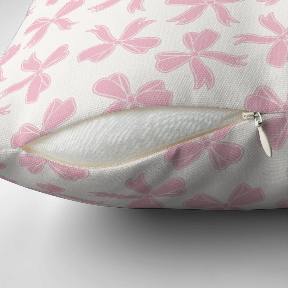 Cute pink bow decorative pillow with coquette aesthetic and hearts