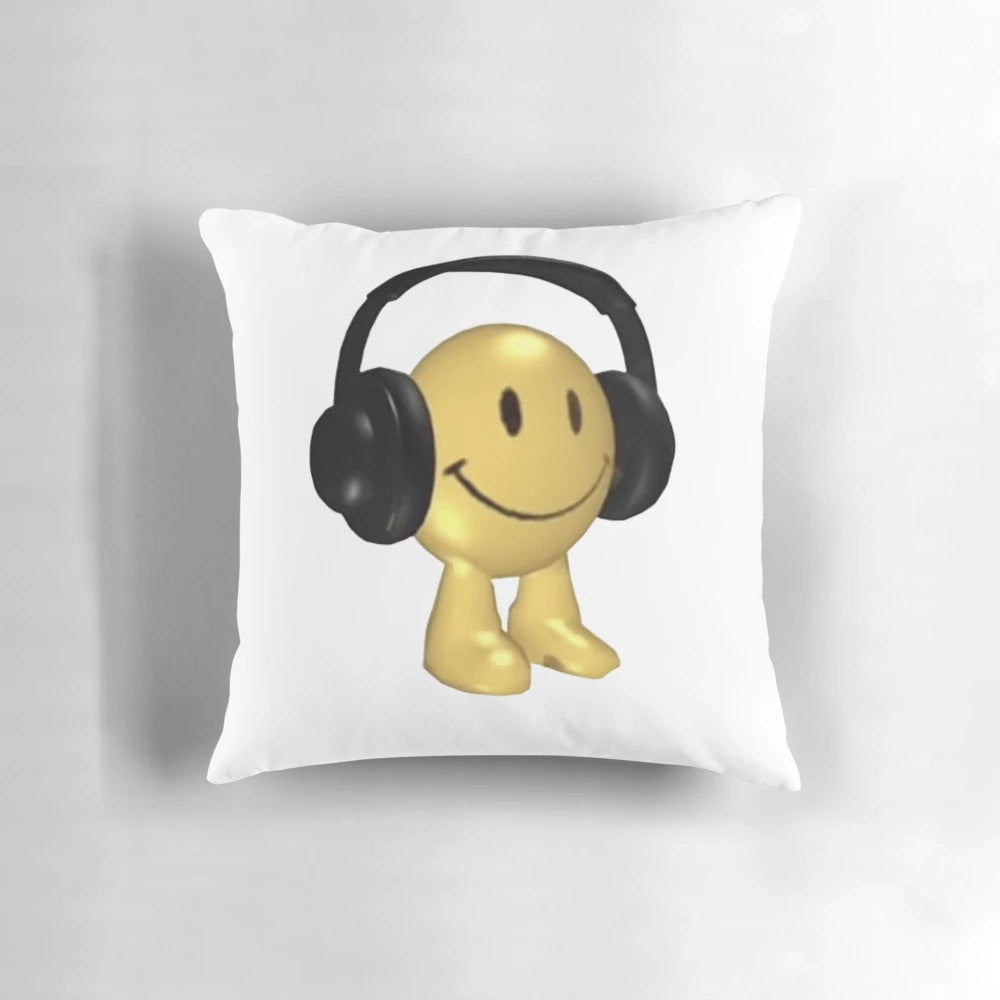 Glaggle Headphone Pillow with a colorful, 3D art design and a smiling face