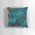 A decorative pillow featuring a golden and teal watercolor design with gemstones and minerals.