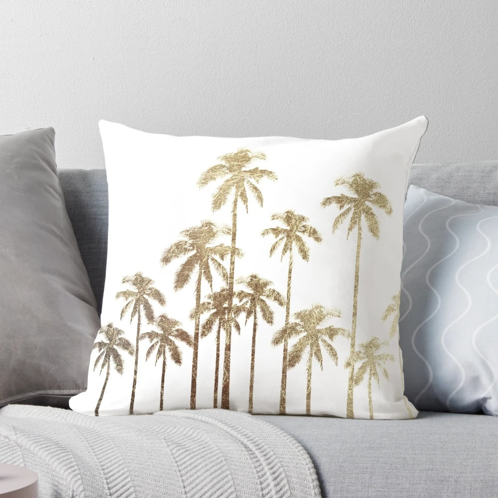 Glamorous gold tropical palm trees printed on a white decorative throw pillow