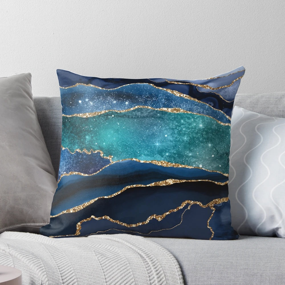 Glamour Milky Way Faux Marble Galaxy Pillow with a modern, abstract, and minimalist design featuring a blue and gold marble pattern that resembles a galaxy in space.