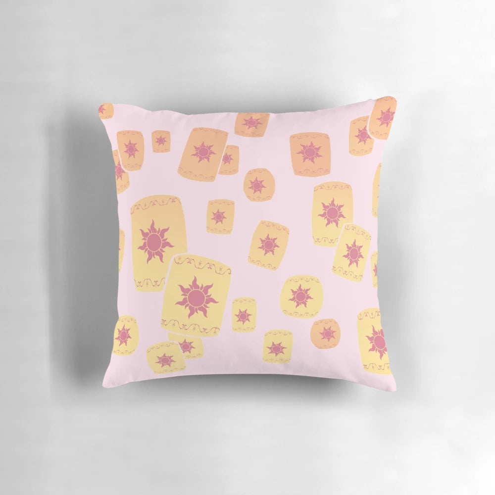 Vibrant, floating sun lanterns in a Disney Tangled-inspired design on a decorative pillow.