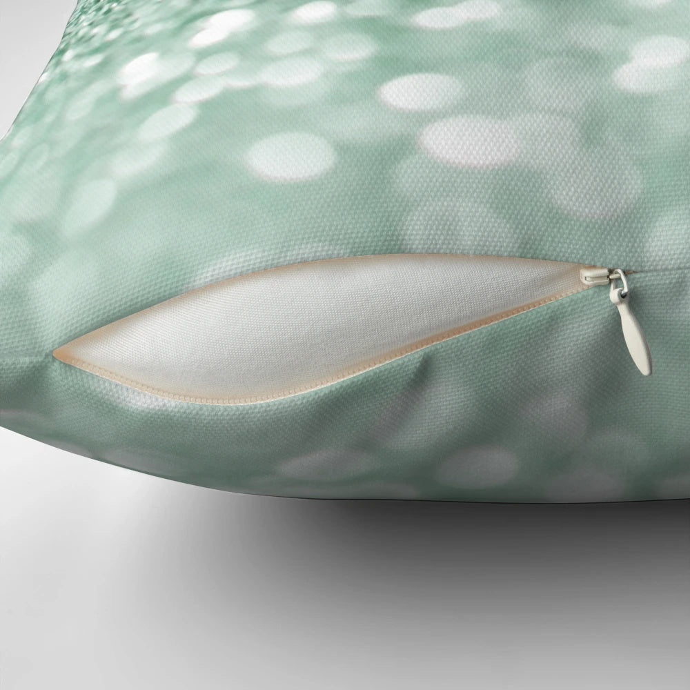 Glittering mint green decorative pillow with marble, stone, and crystal accents