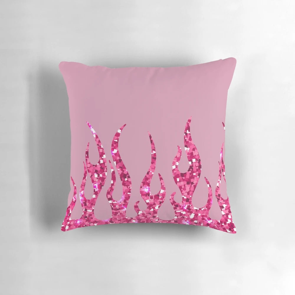 Vibrant pink pillow with glittering flames, perfect for a Y2K-inspired, retro aesthetic